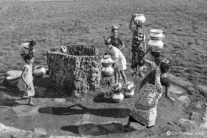 Preparing to return home after completion of morning chores at the Kukuru Daarhi in Jiuri village, jahrkhand, India